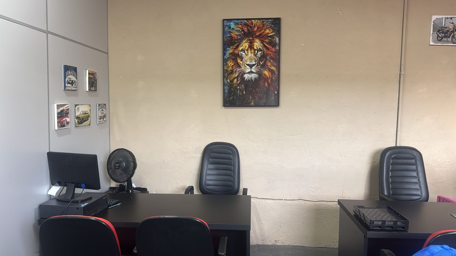 Escritório DL — quadro do leão